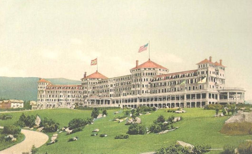 a large building with a flag on top