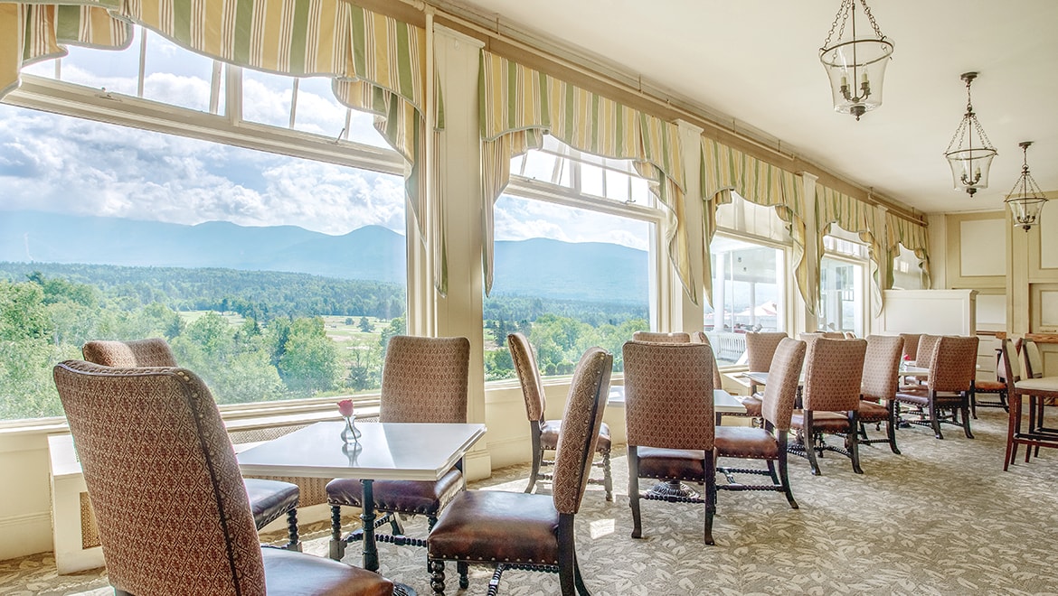 a room with a table and chairs