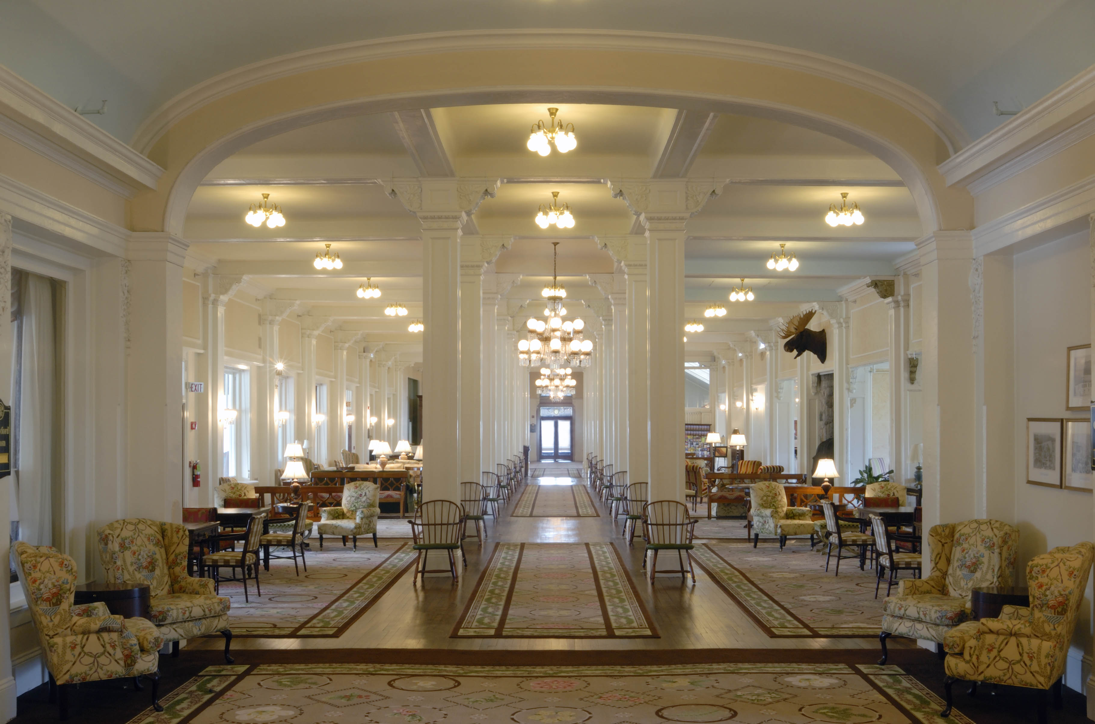 a large room with many chairs and tables
