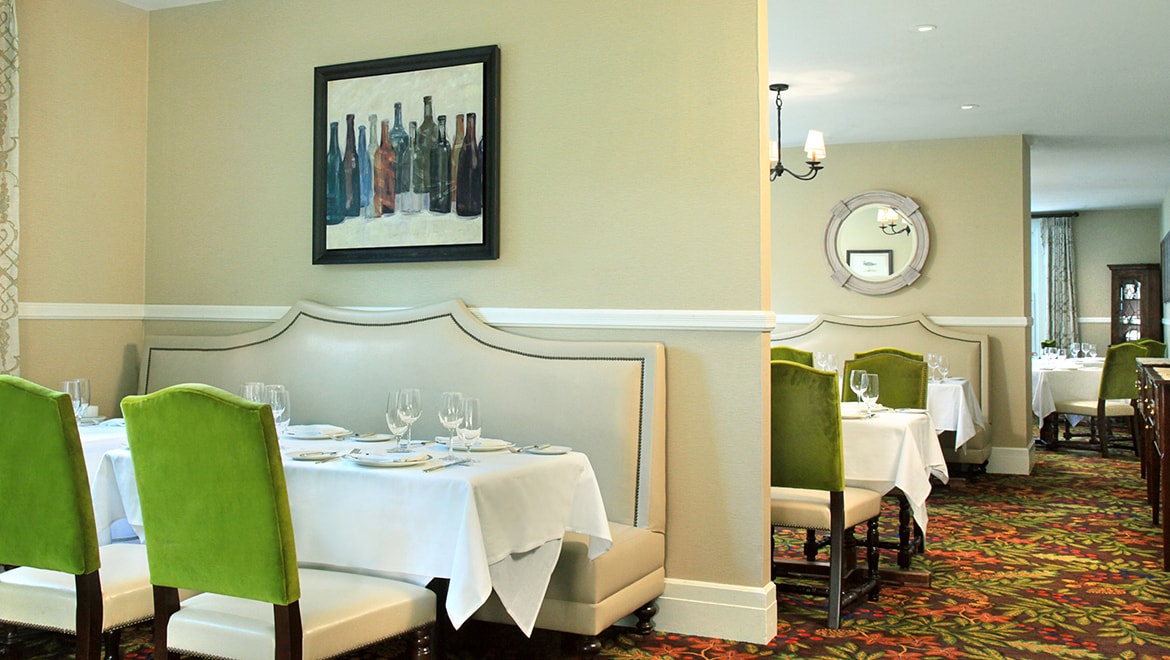 a restaurant with tables and chairs