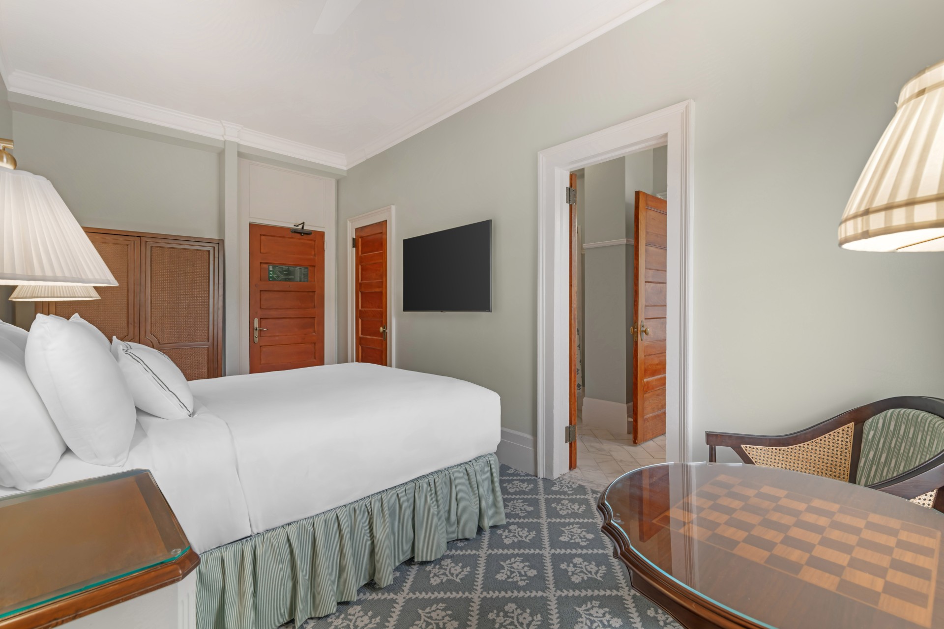 a room with a bed and a table