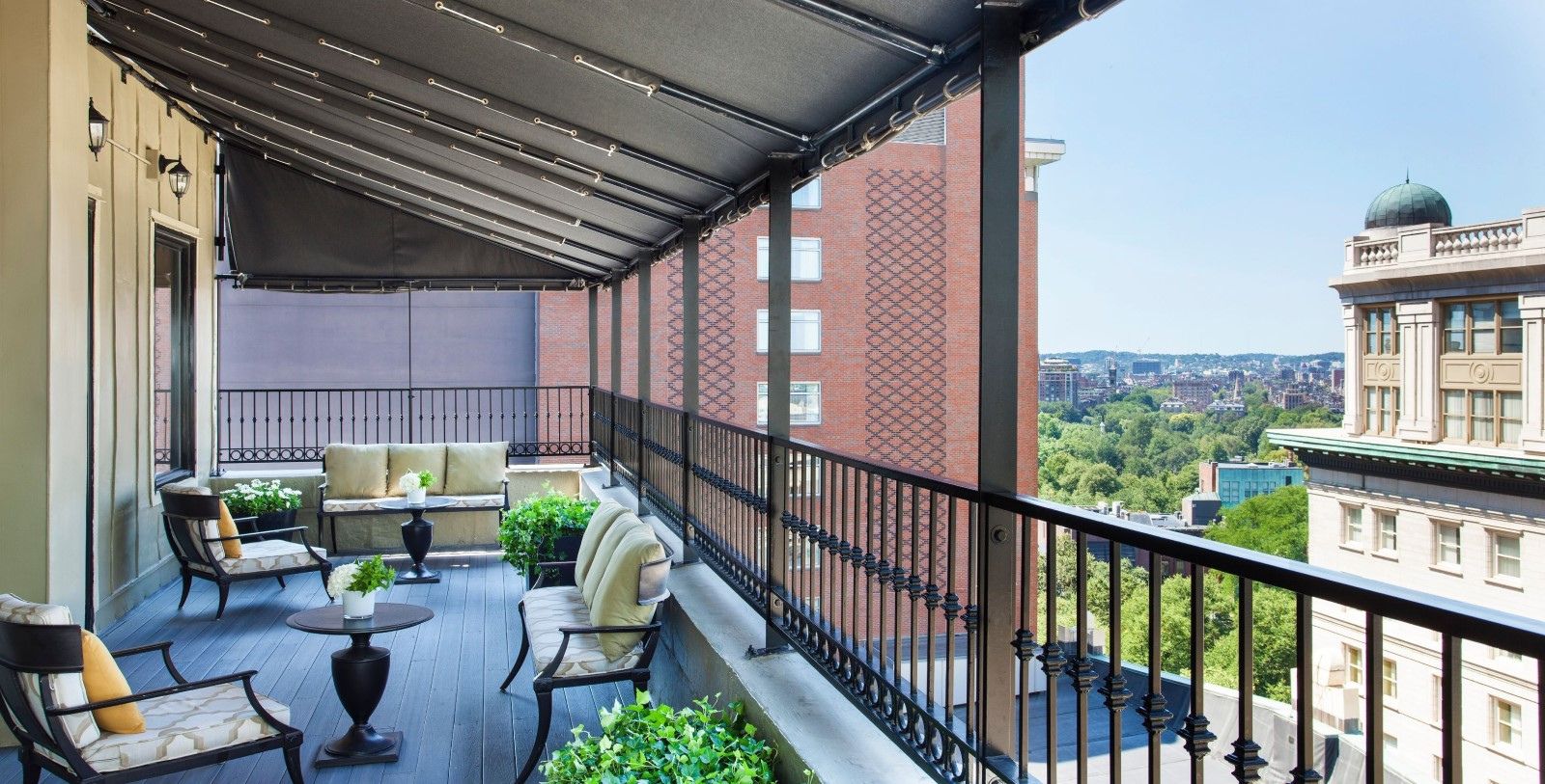 a patio with a table and chairs