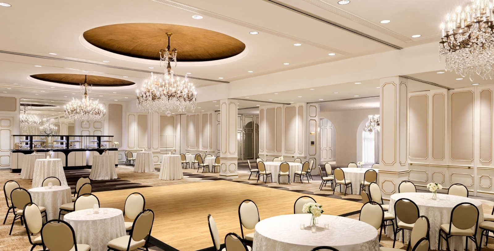 a room with tables and chairs