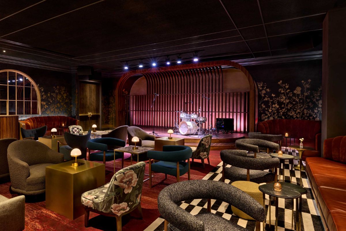 a room with chairs and a drum set