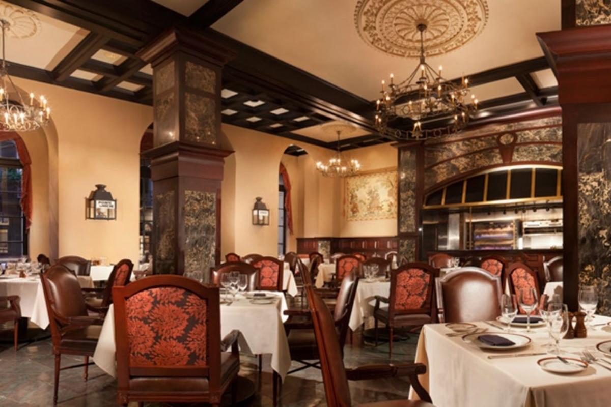 a restaurant with tables and chairs