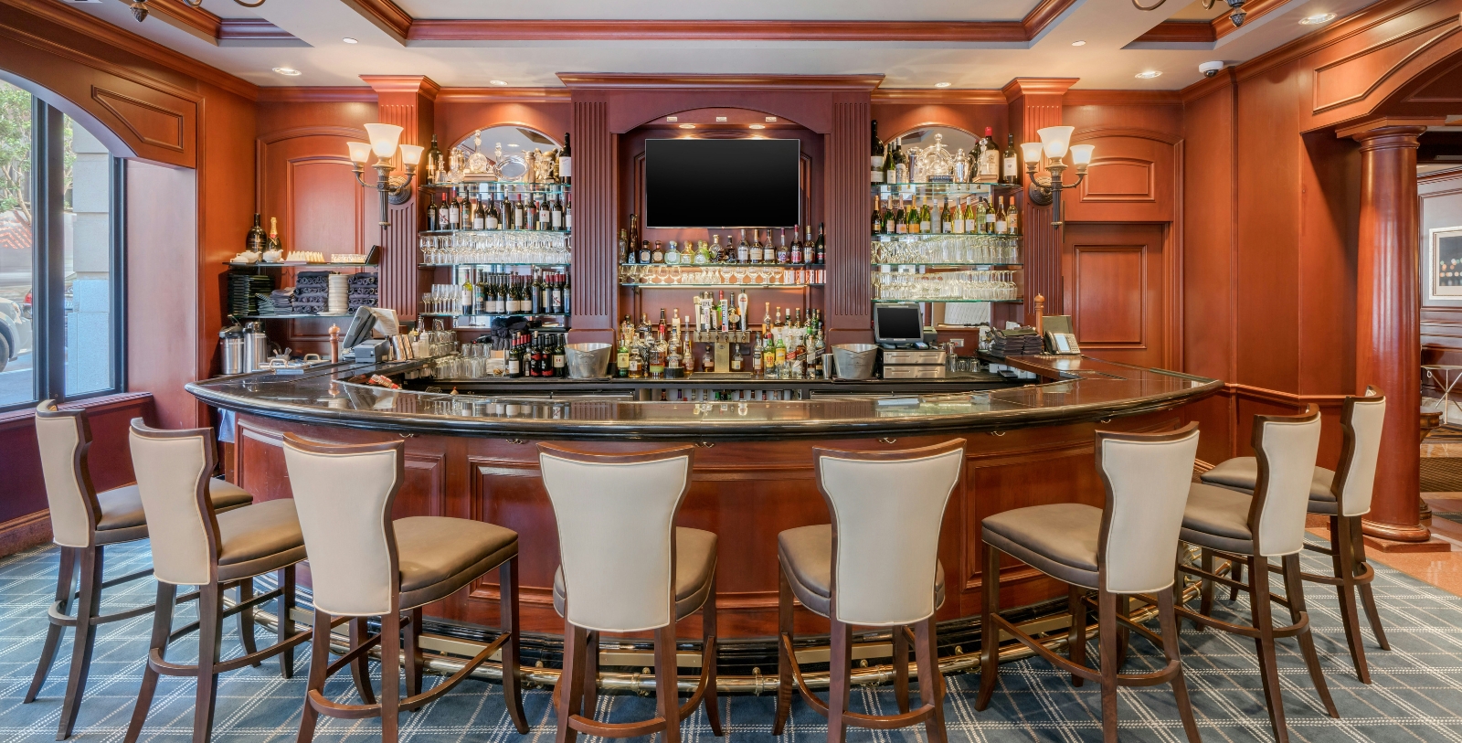 a bar with a bar and a tv