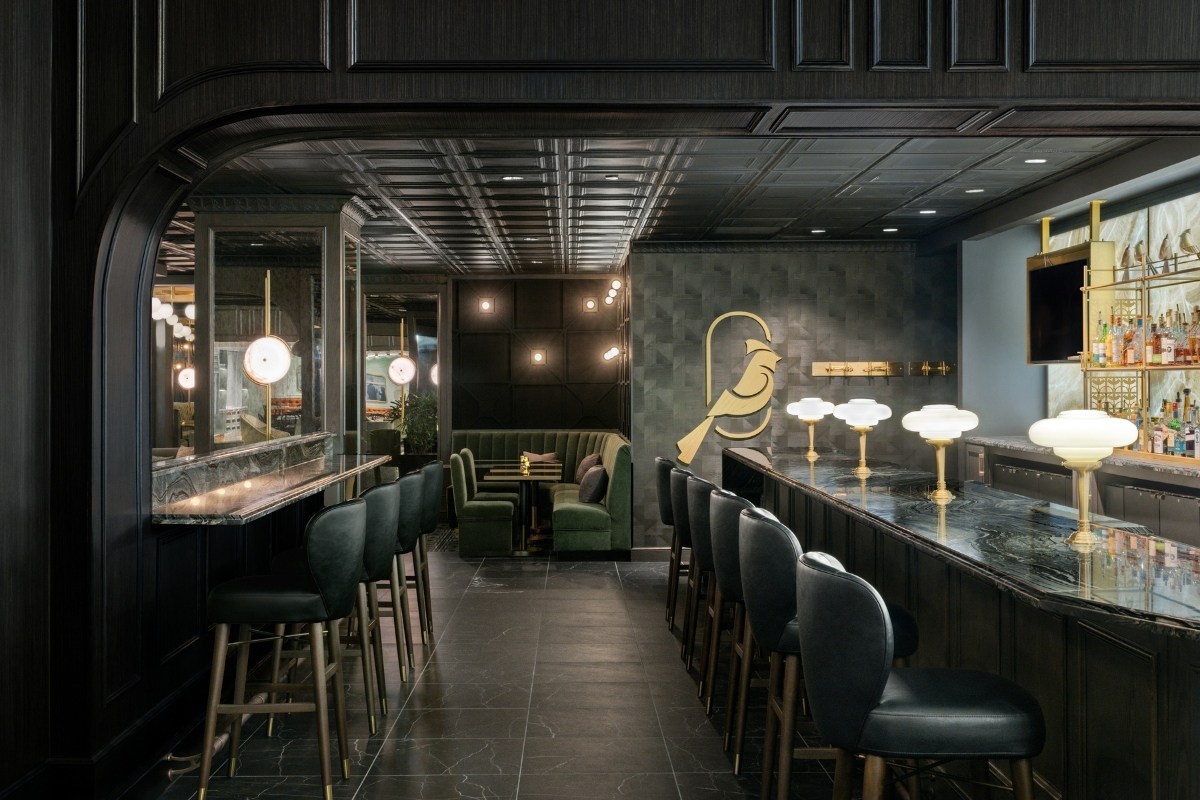 a bar with chairs and tables