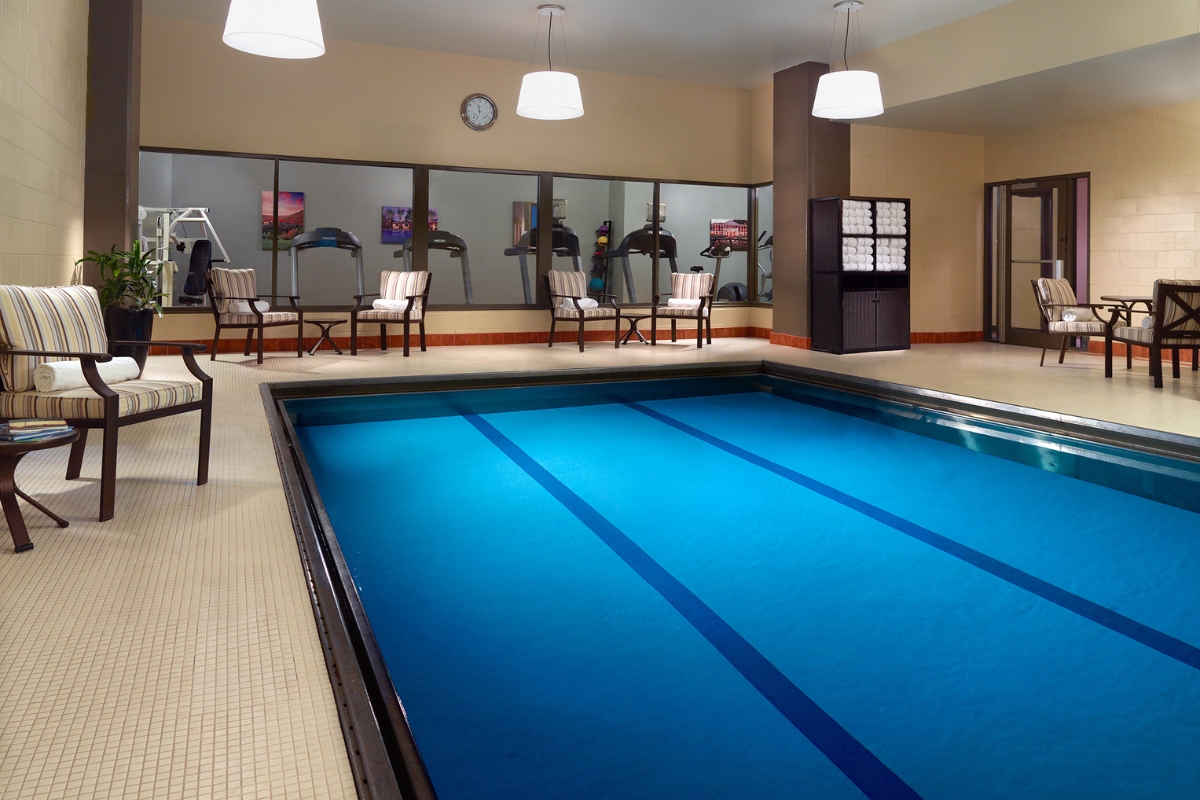 a swimming pool inside a gym
