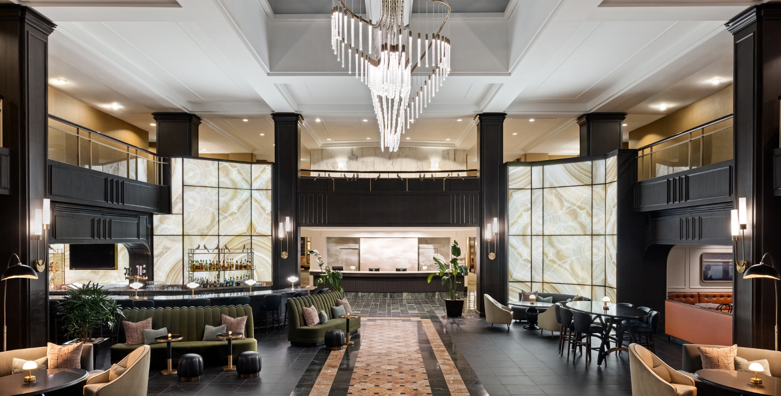 a large room with a chandelier and tables