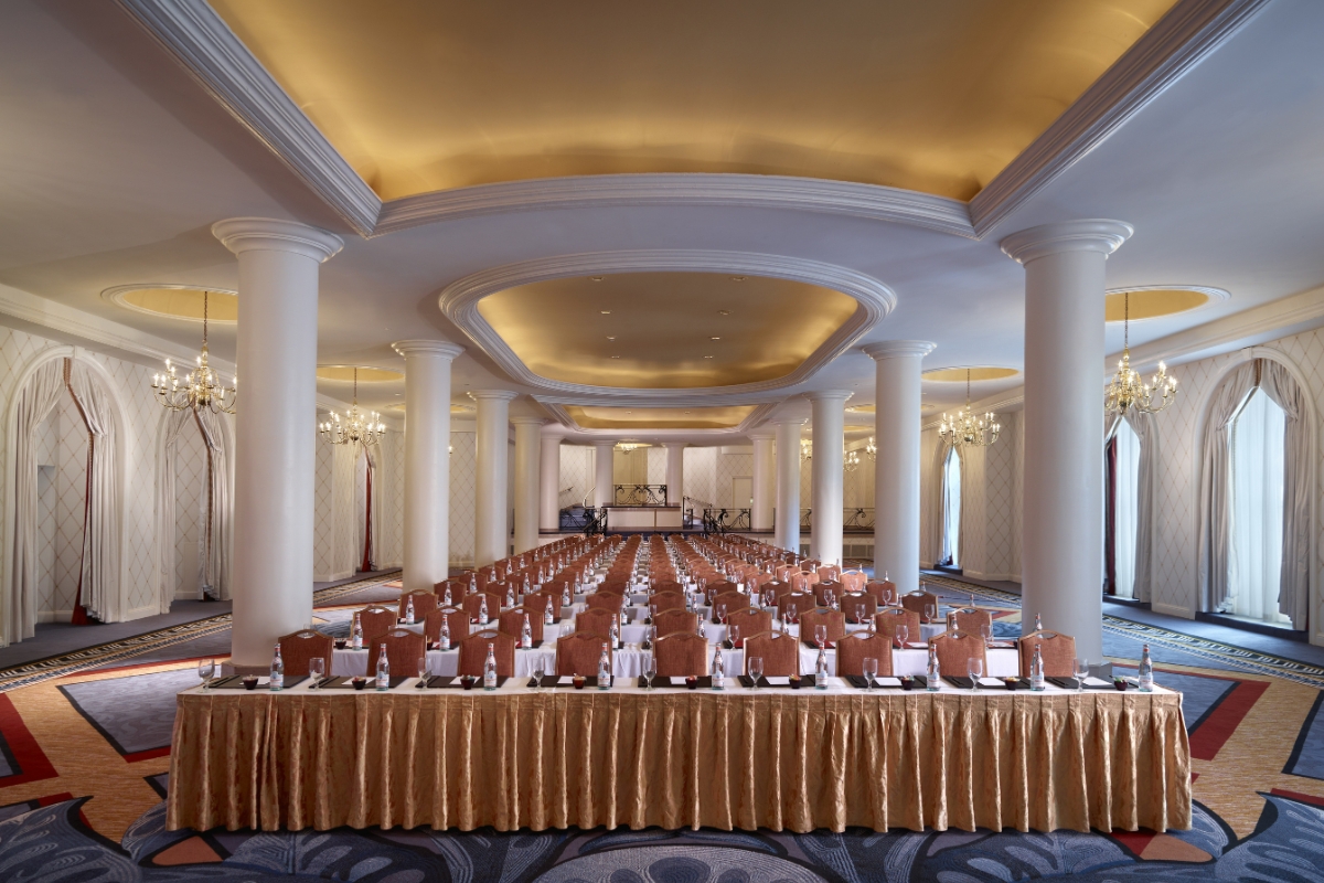 a large room with a large table with chairs and tables