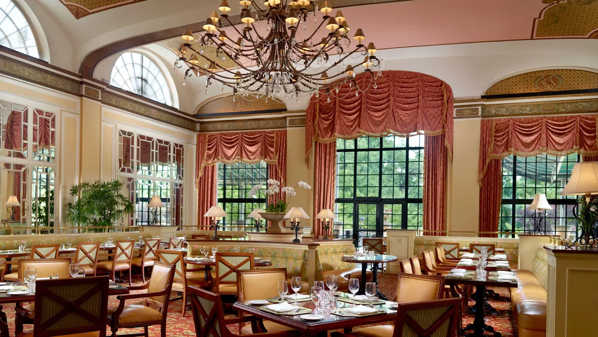 a room with tables and chairs
