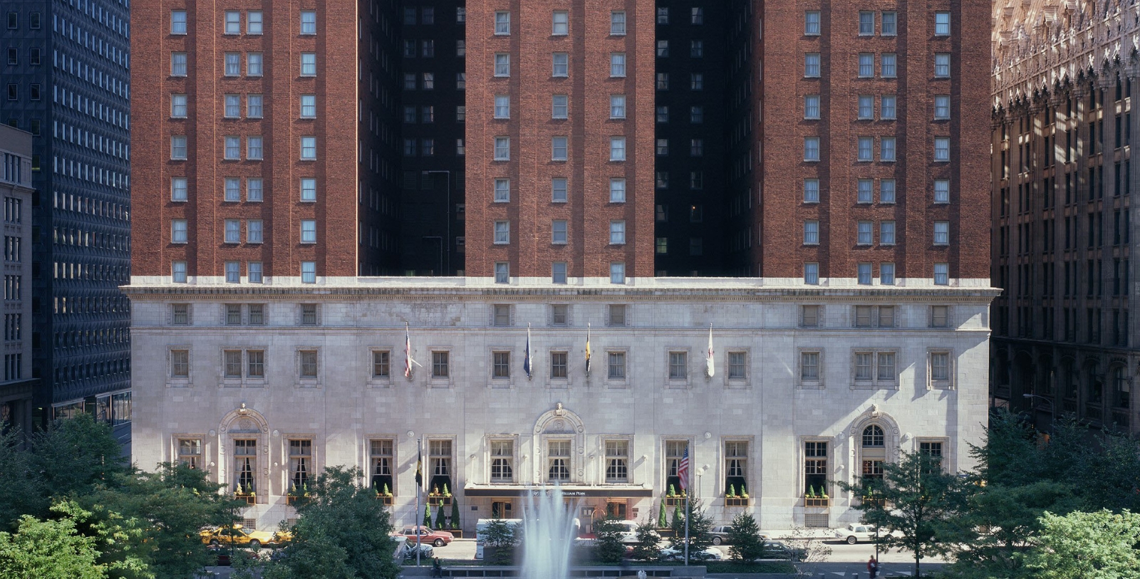 a fountain in front of a building