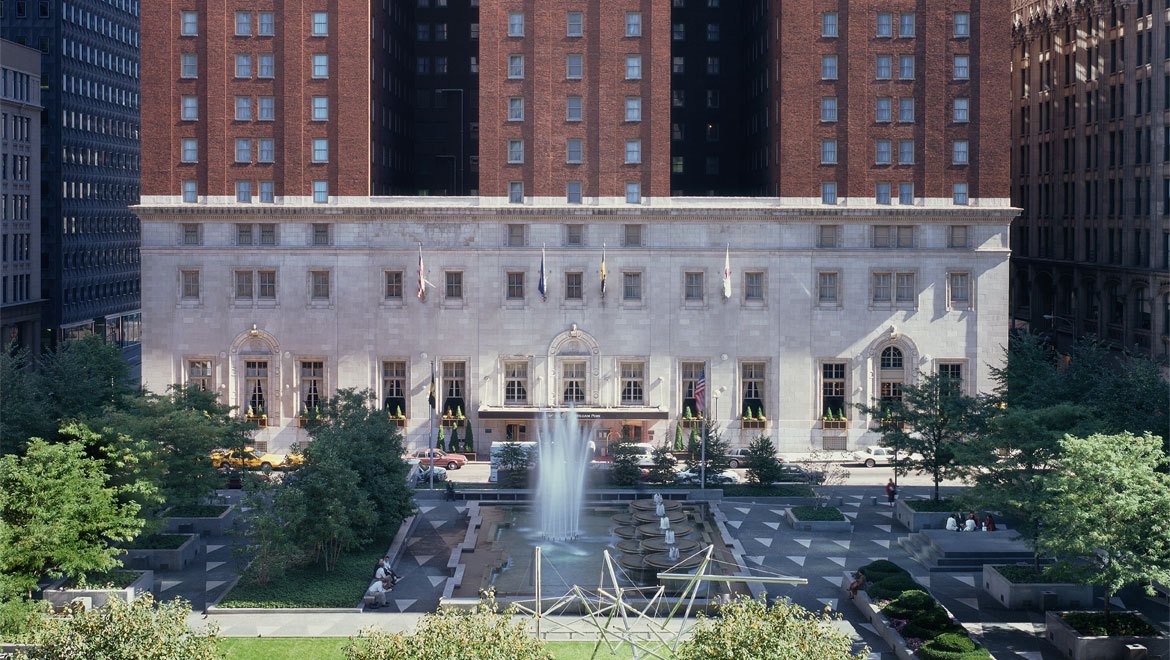 a fountain in front of a building