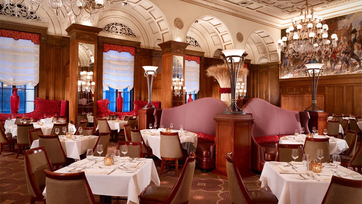 a restaurant with tables and chairs