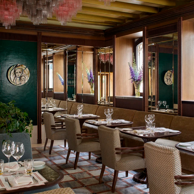 a restaurant with tables and chairs