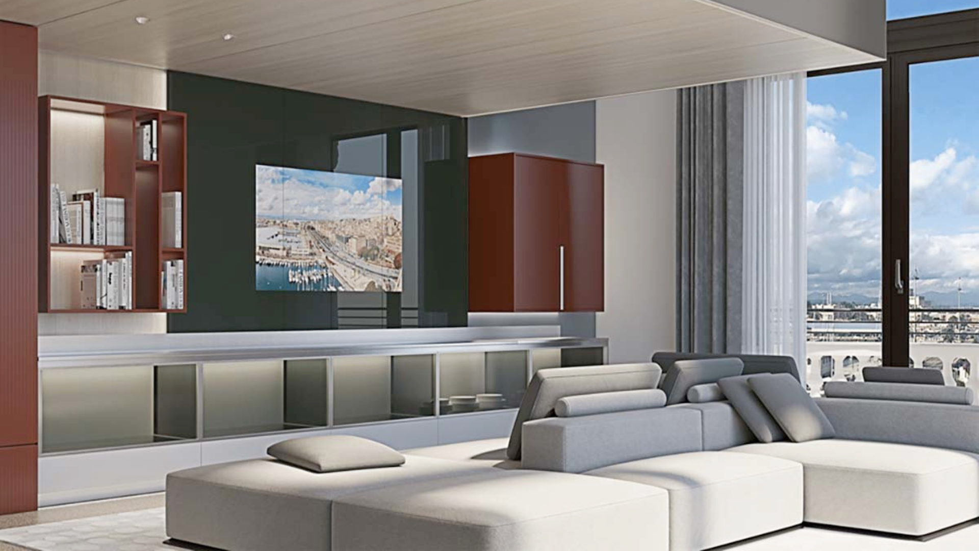 a living room with a large couch and a tv