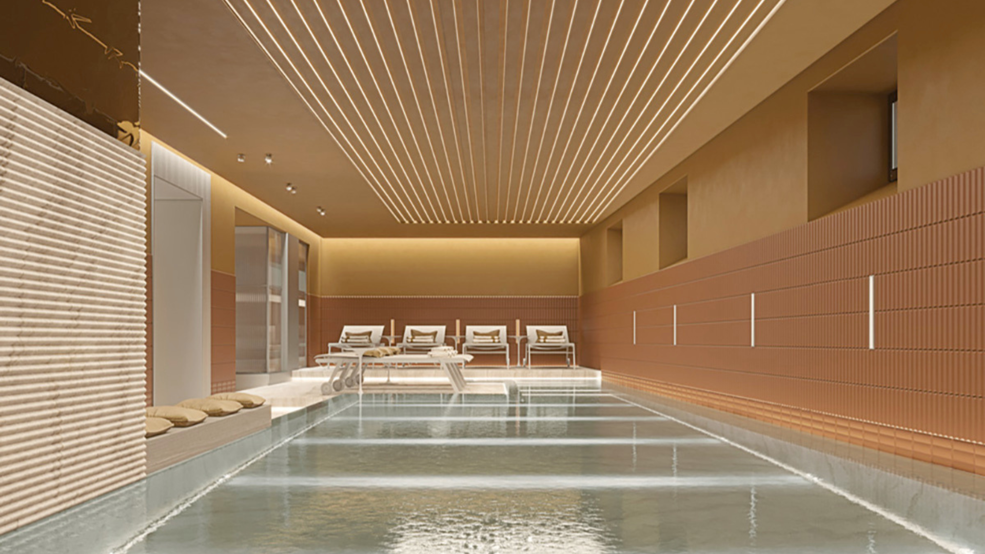 a indoor pool with chairs and a bench