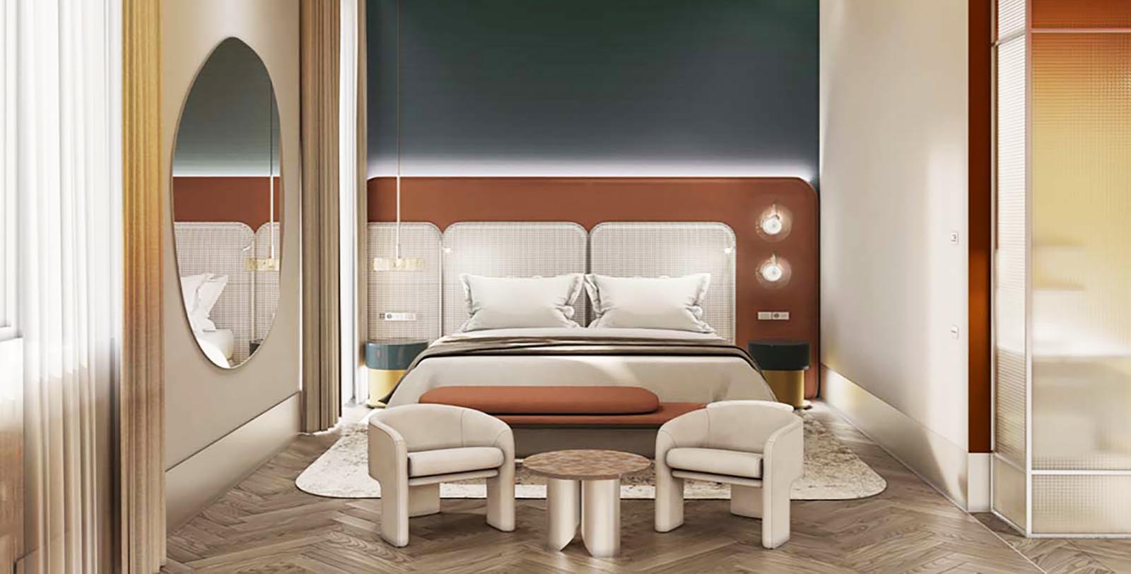a room with a bed and chairs