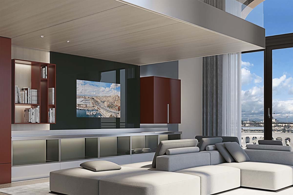 a living room with a large couch and a tv