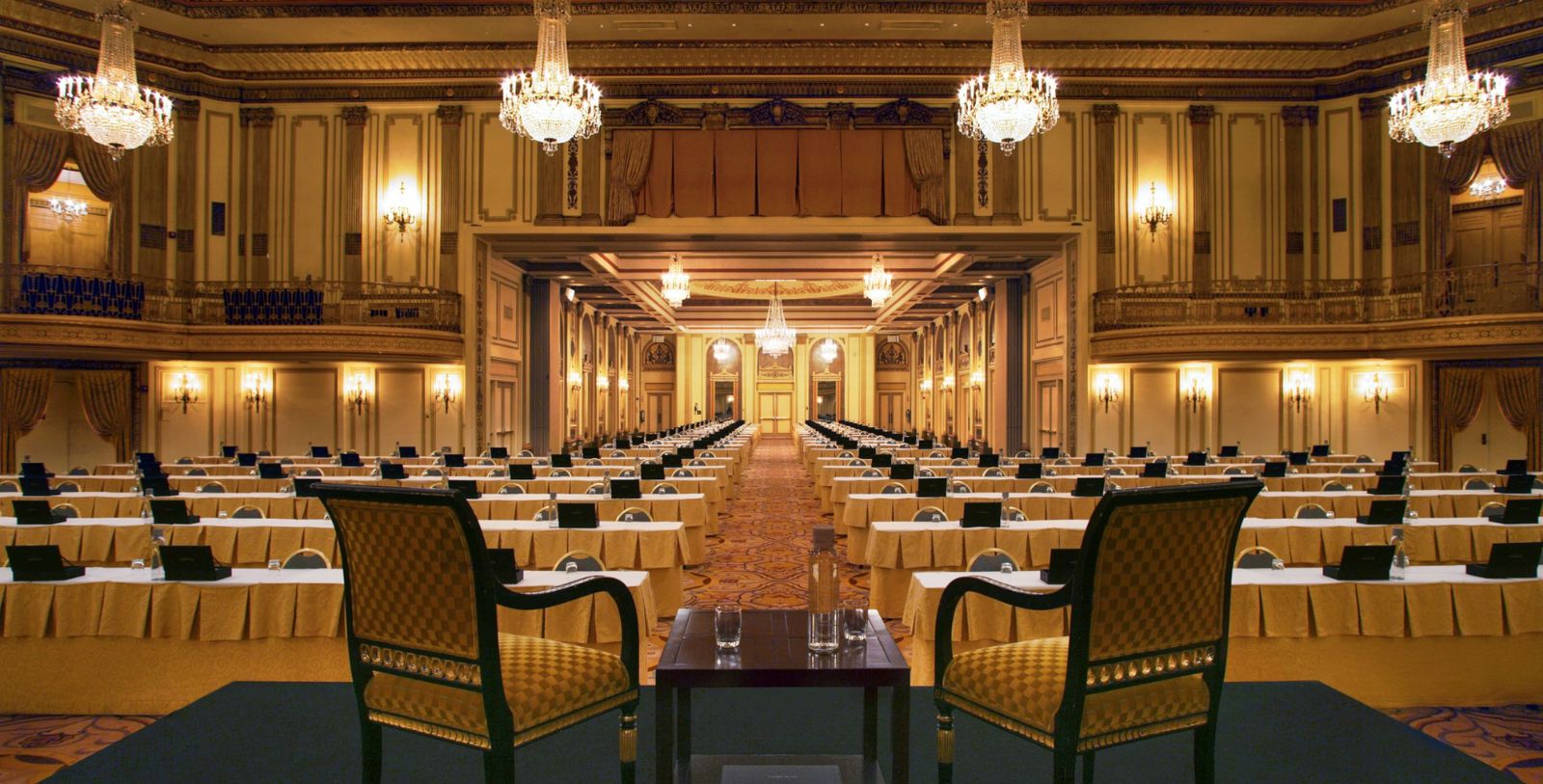 a room with tables and chairs