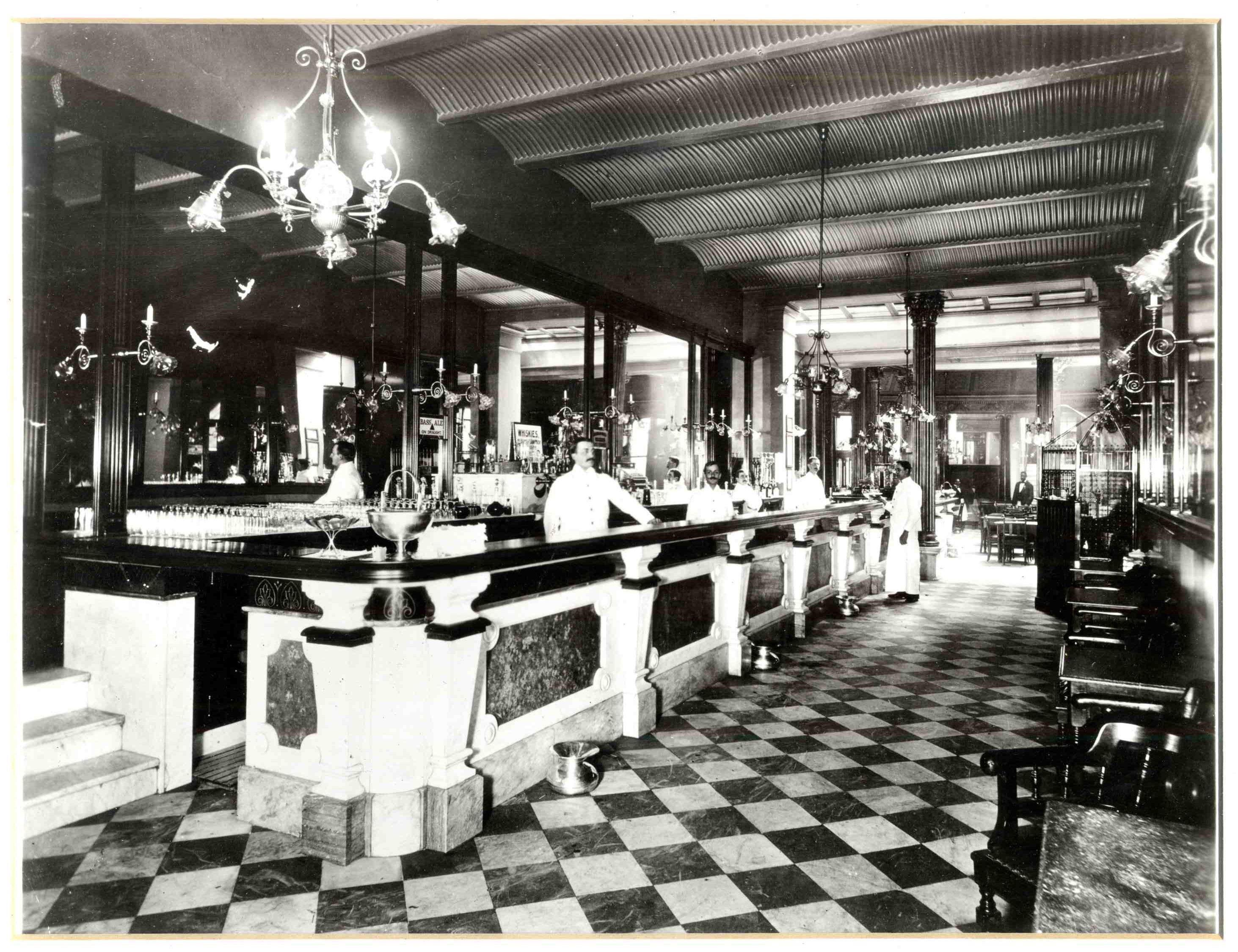 a man standing at a bar