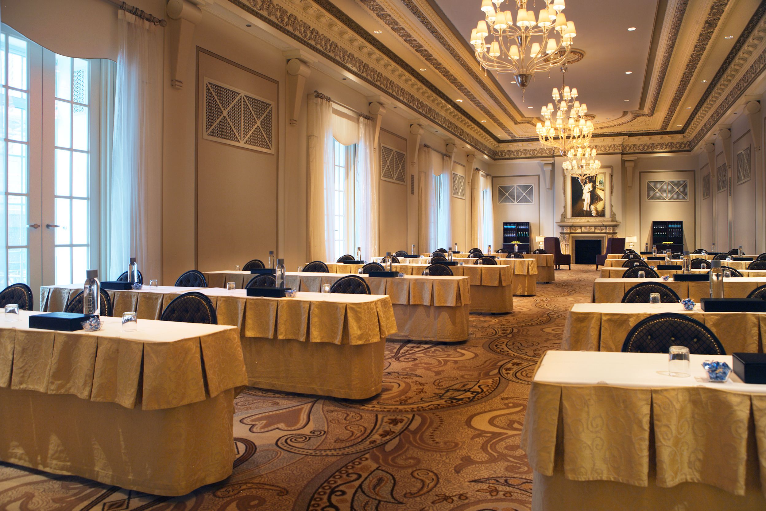 a room with tables and chairs