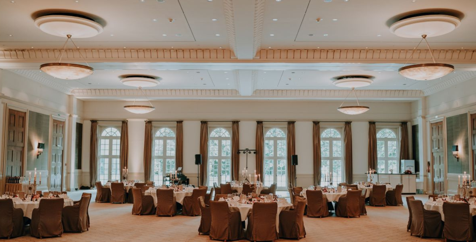 a room with tables and chairs