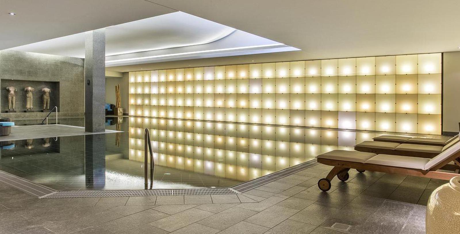 a indoor pool with lights
