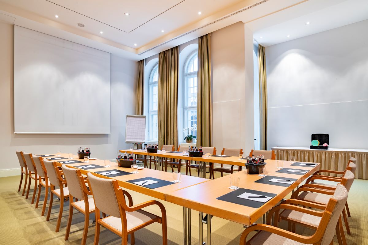 a room with tables and chairs