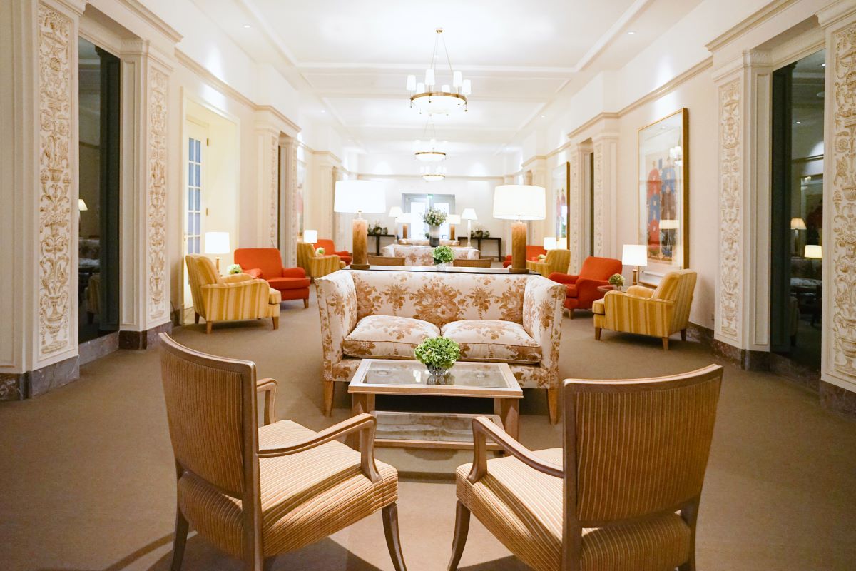 a room with chairs and a couch