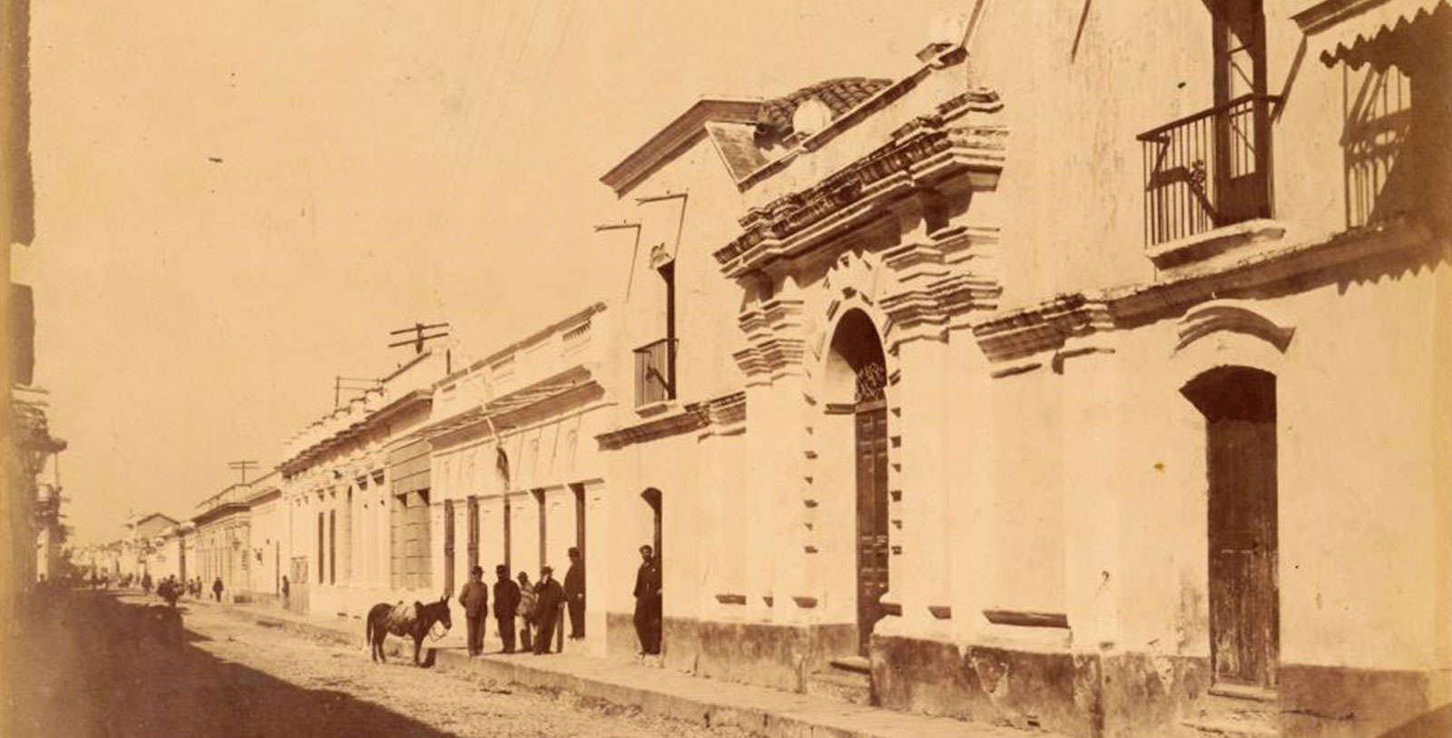 a group of people standing on a street