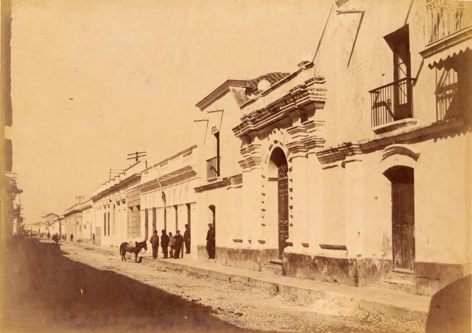a group of people standing on a street