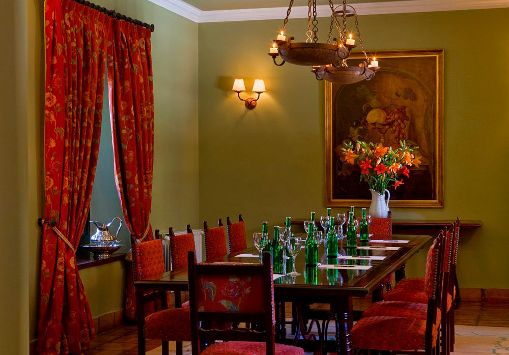 a room with a table and chairs