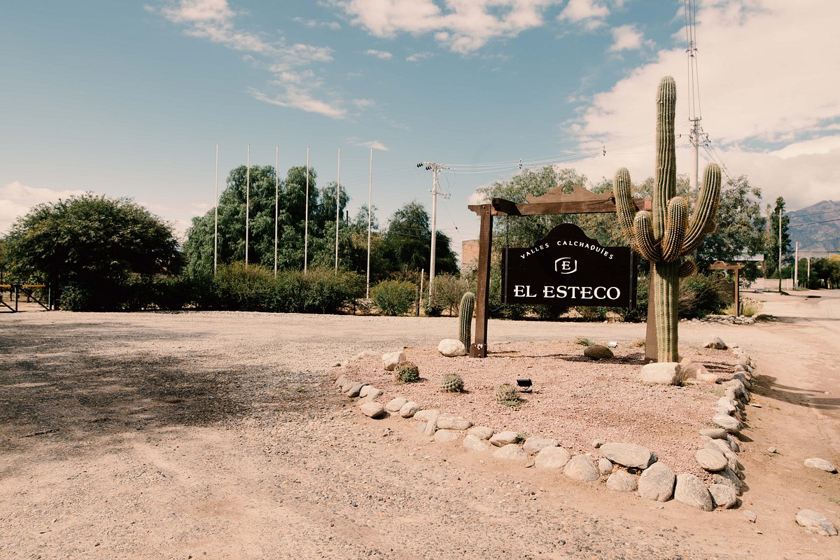 a sign in front of a road
