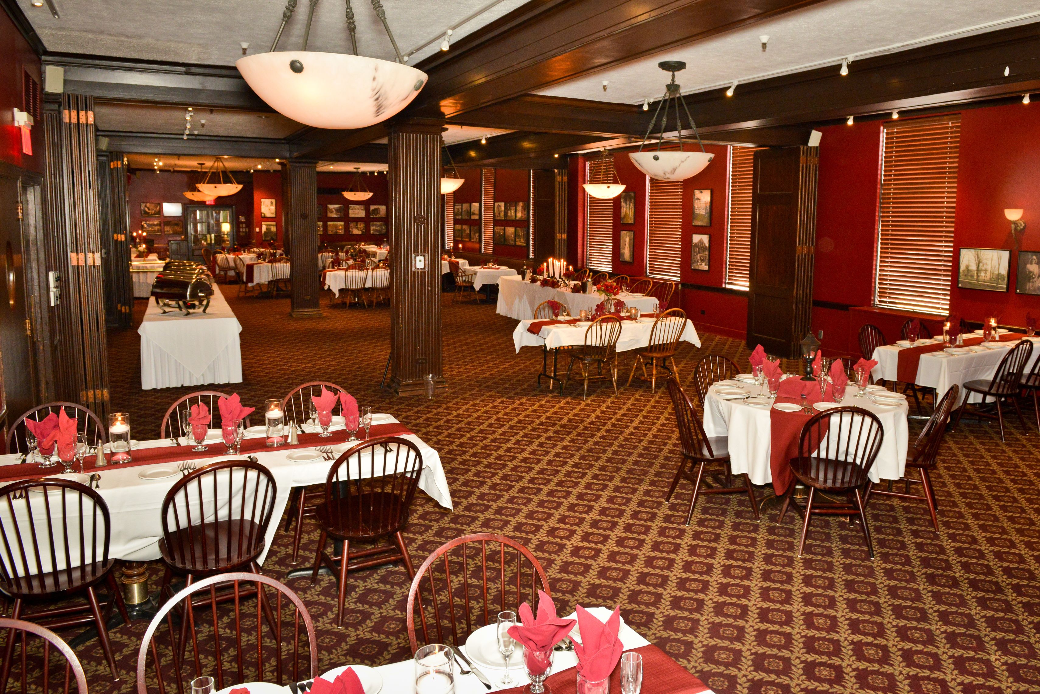 a room with tables and chairs
