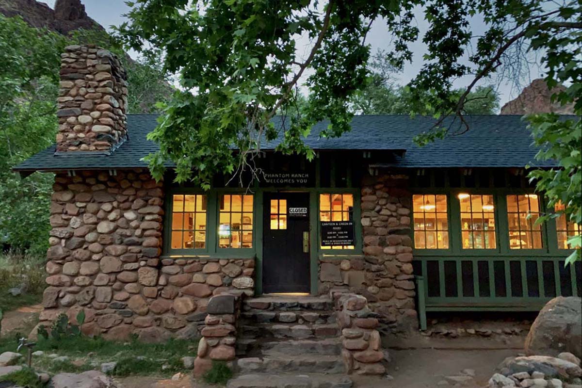 a stone building with a stone chimney