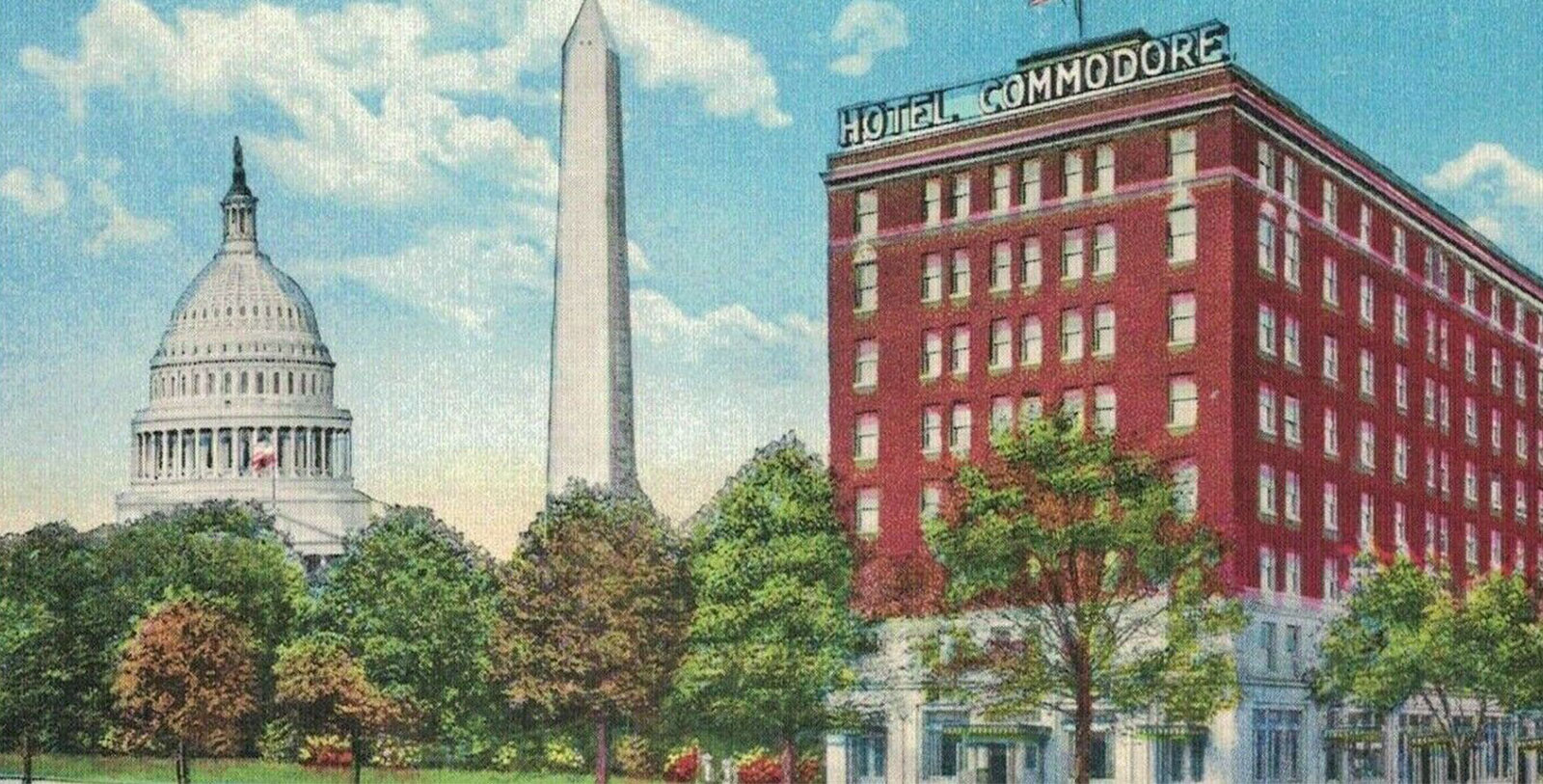 a tall tower in front of a hotel