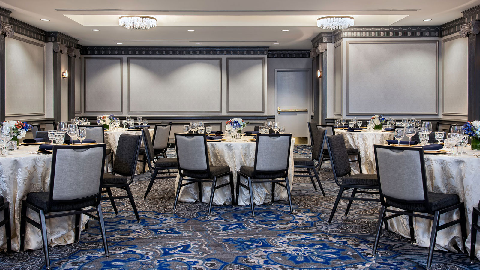 a room with tables and chairs