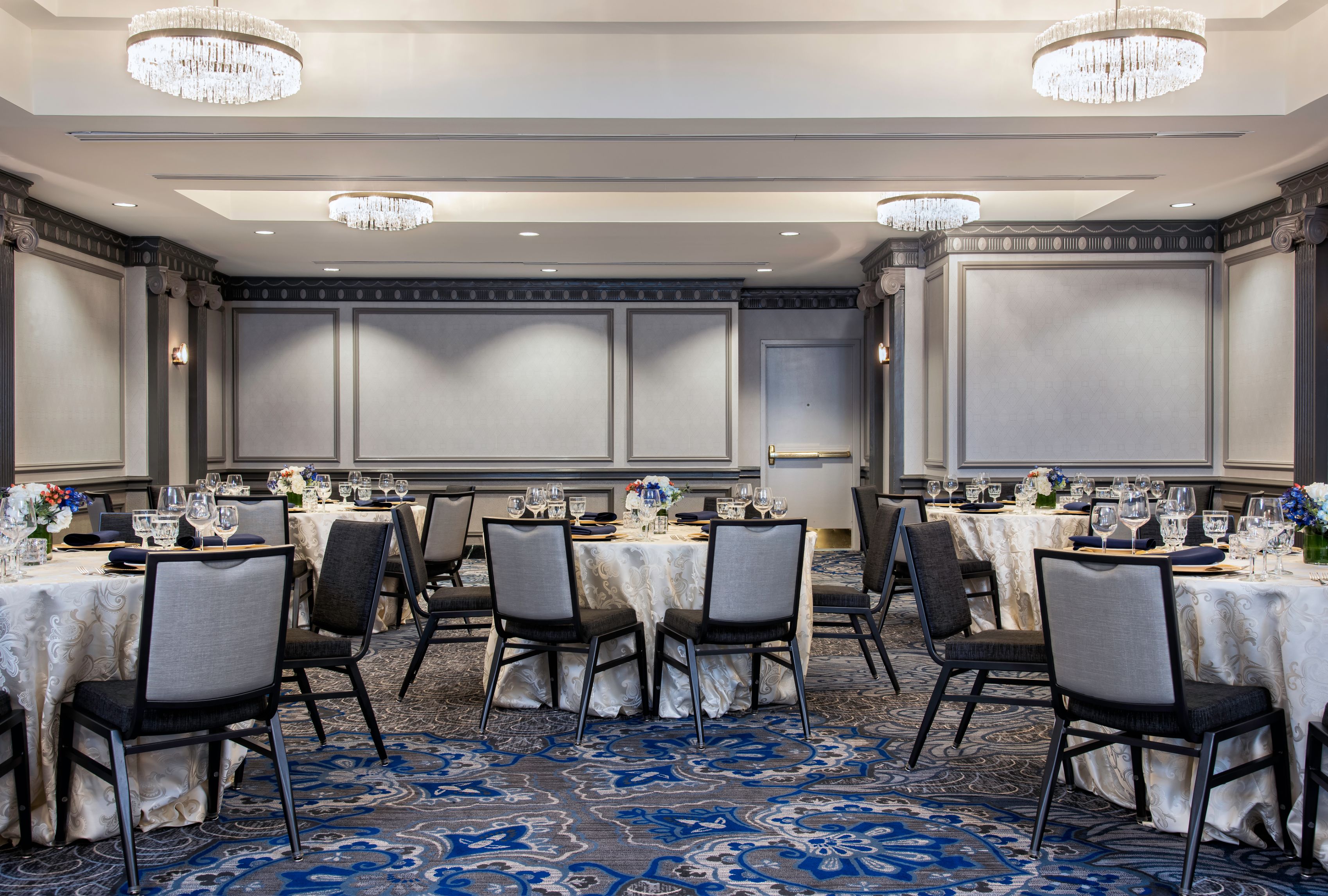 a room with tables and chairs