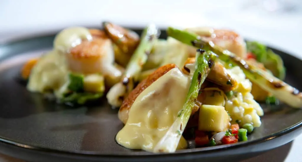 a plate of food with sauce
