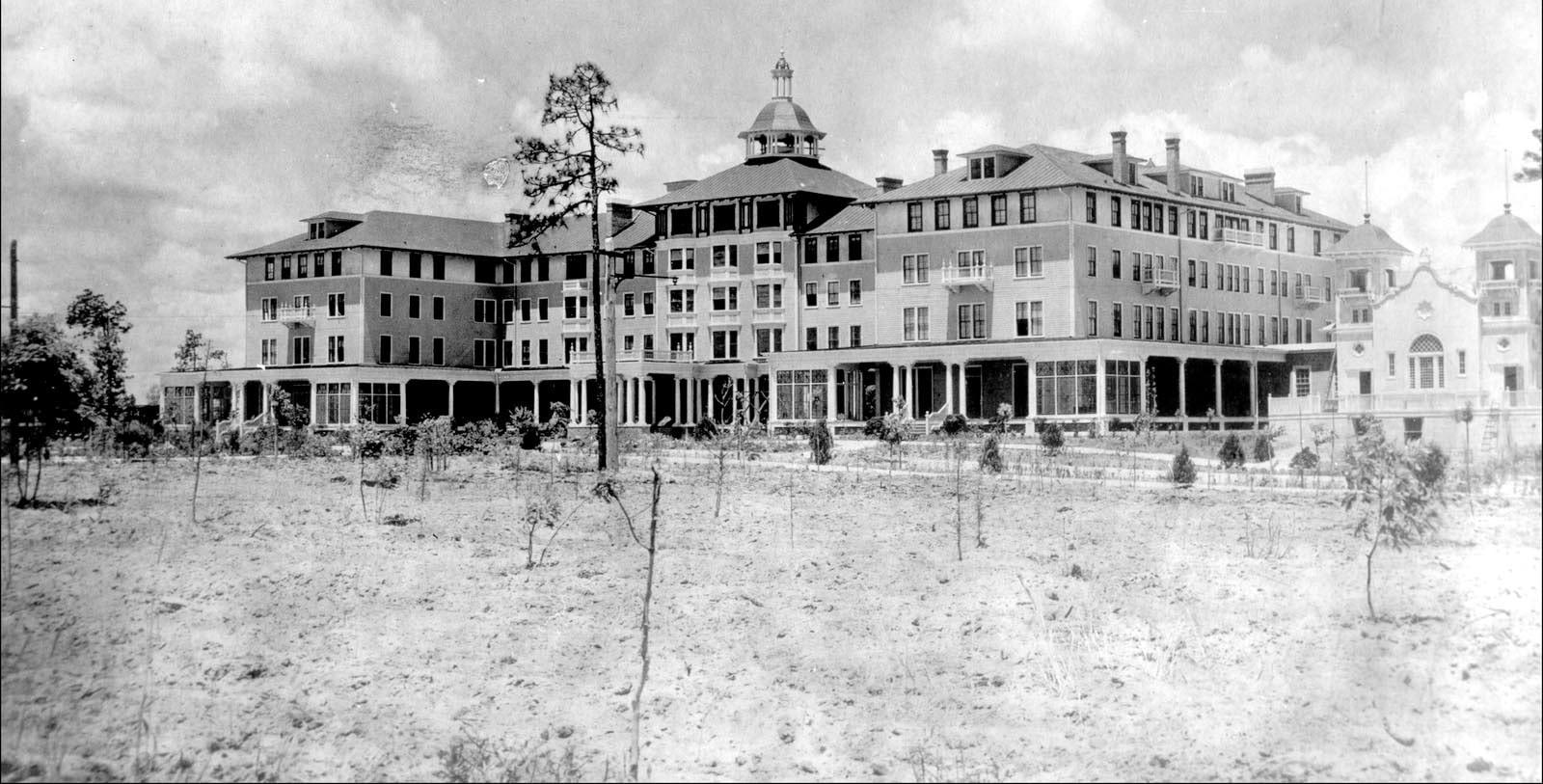 a large building with a large lawn