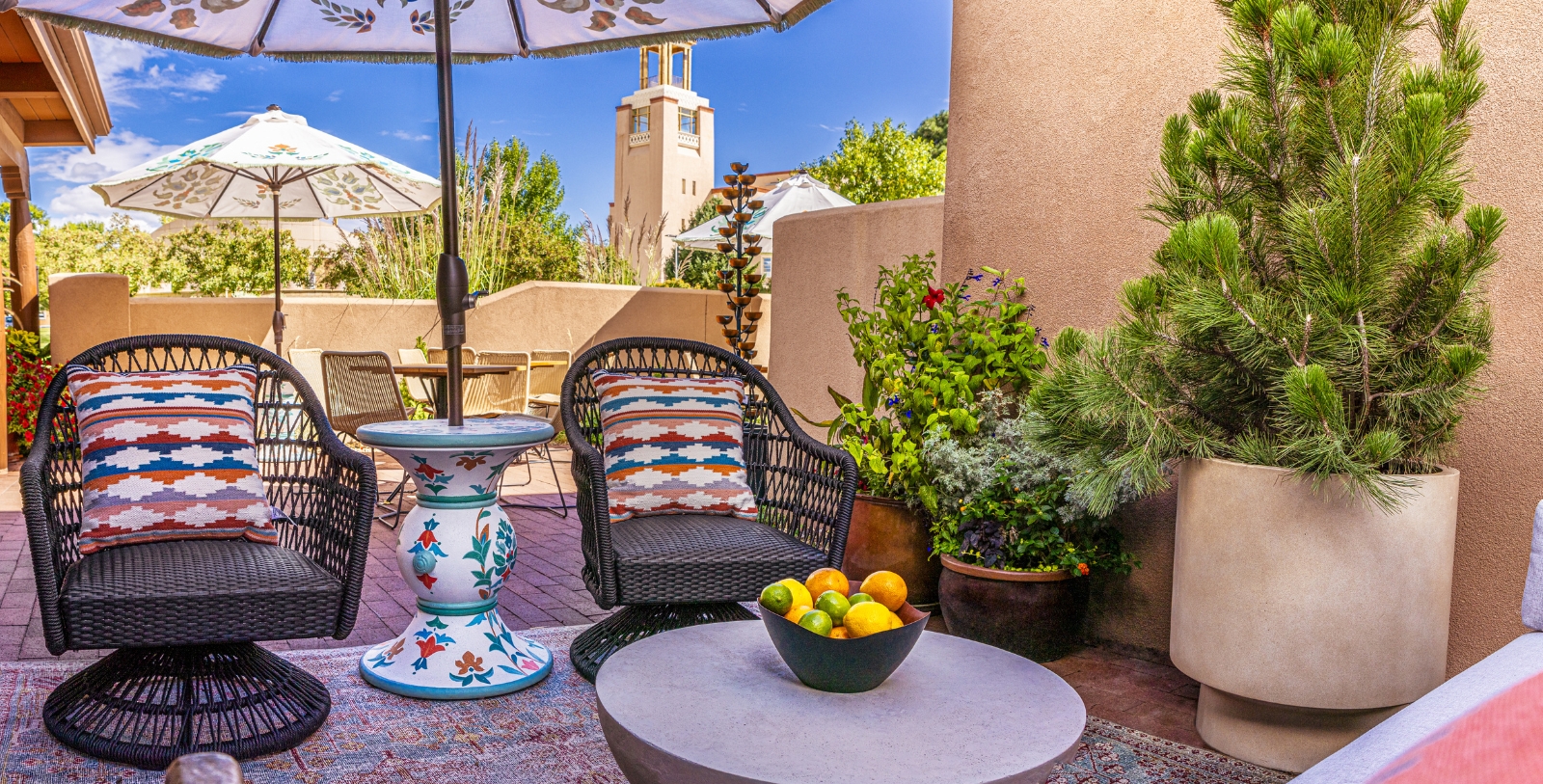 a patio with a chair and a table