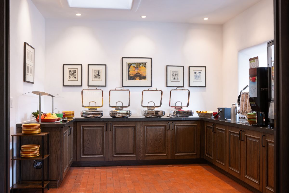 a kitchen with a row of food containers