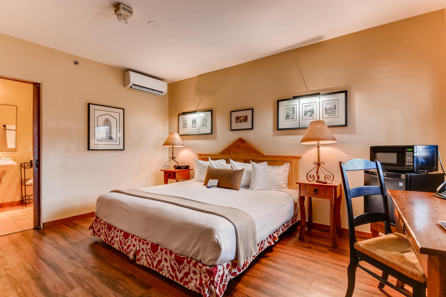 a room with a bed and a chair
