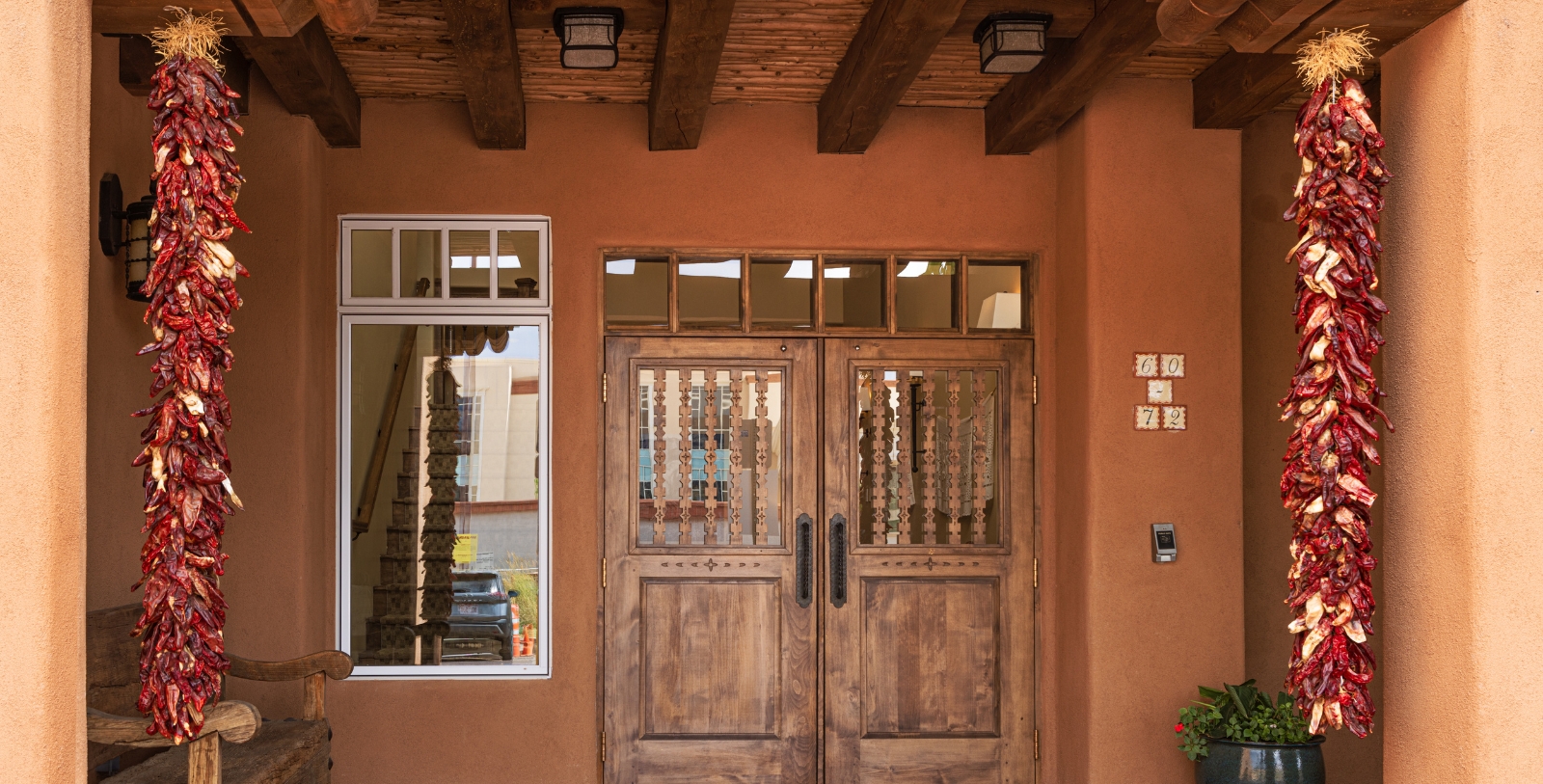 a brown double doors with windows