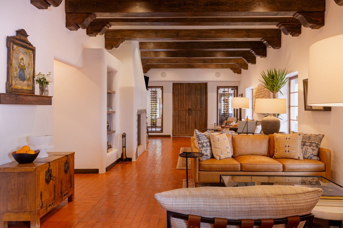 a living room with a couch and a fireplace