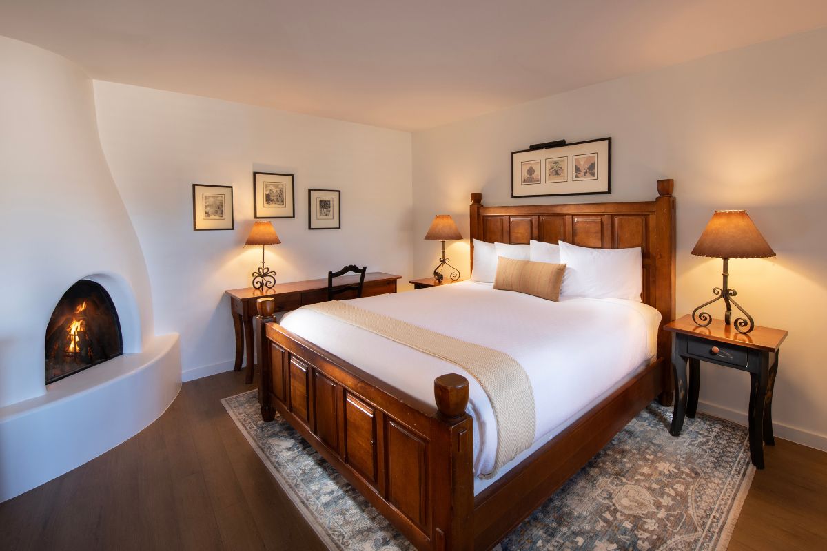 a bedroom with a bed and a bathtub