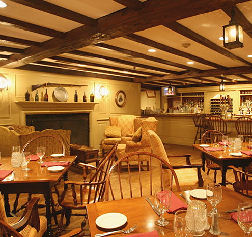 a restaurant with tables and chairs