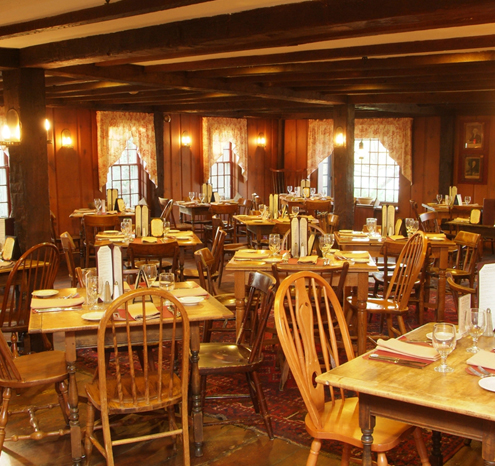 a room with tables and chairs