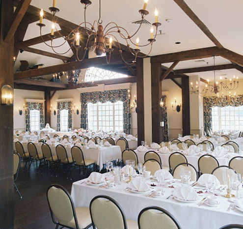 a room with tables and chairs
